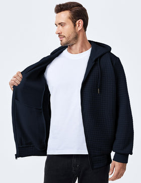 Close-up of jacquard fabric detail on JMIERR plaid hoodie.