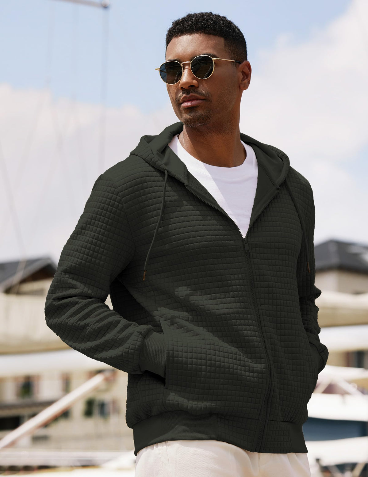 JMIERR model wearing plaid hoodie, relaxed fit and versatile style.