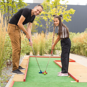 Junkin kids playing foam golf balls for safe family fun