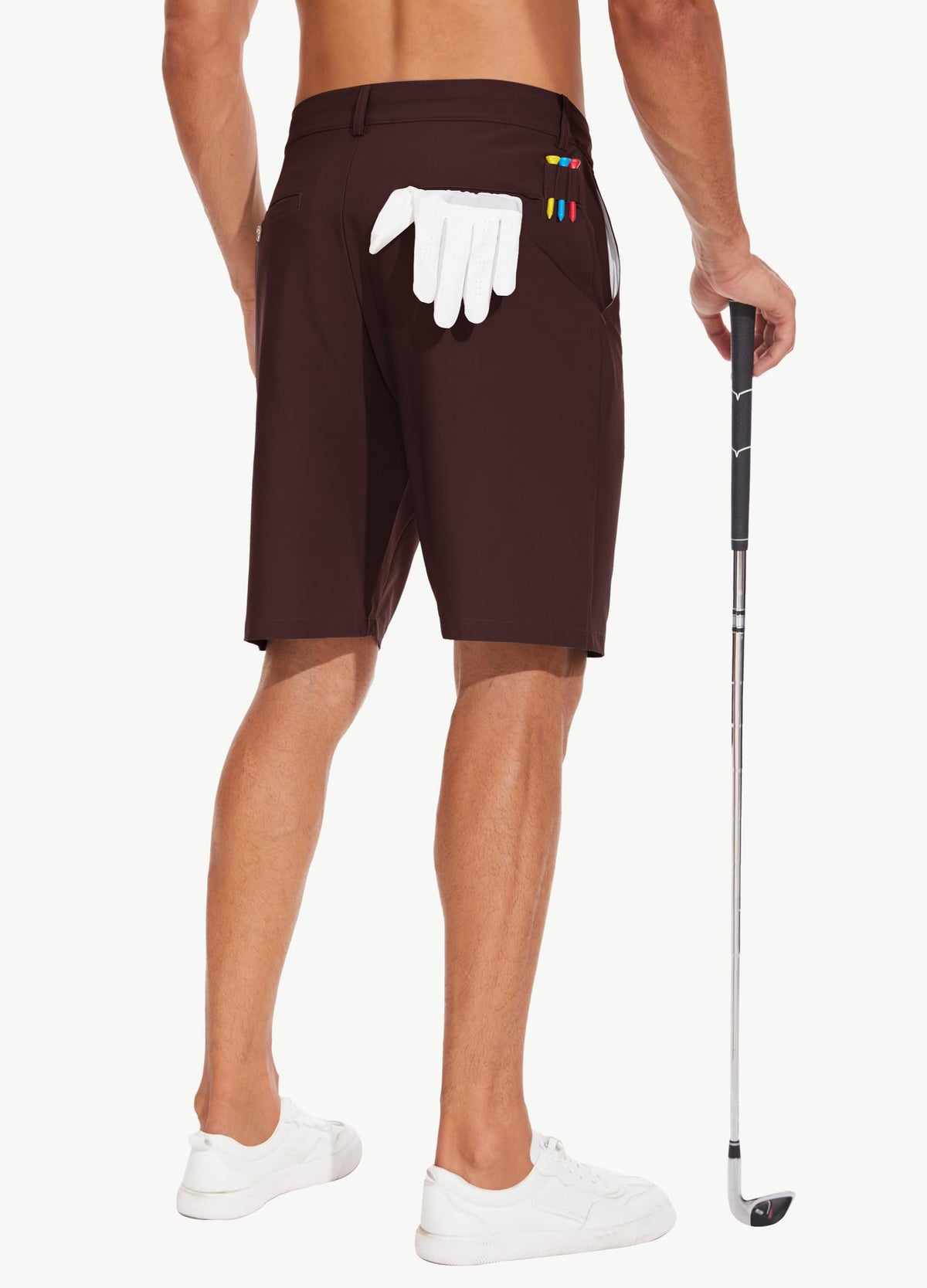 JWM shorts with inner silicone grippers keep shirts tucked during swings.