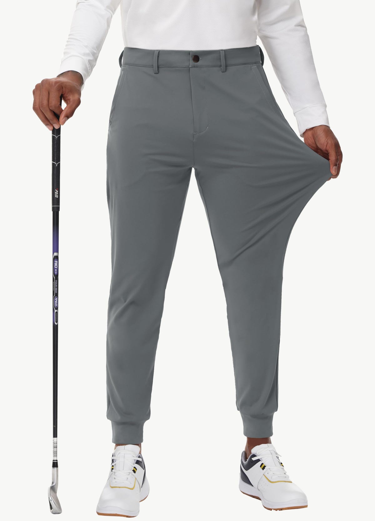 JWM waistband with inner silicone grippers keeps shirts tucked during swings.