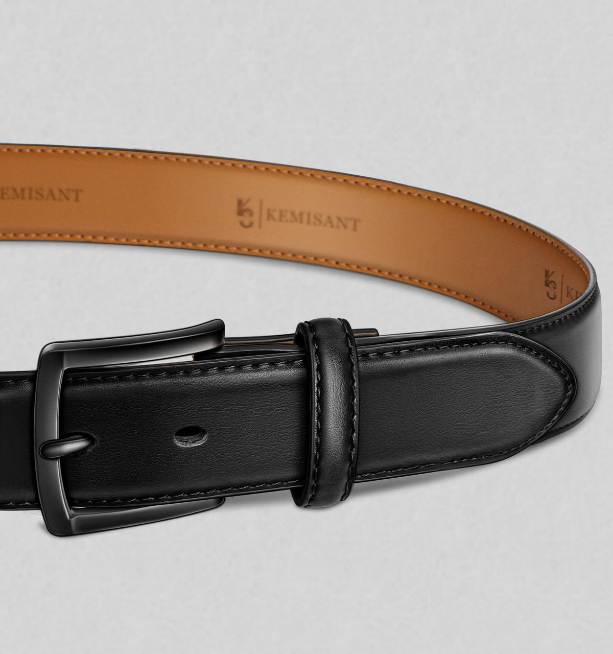 KEMISANT buckle closeup shows a polished metal closure