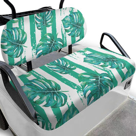 Knextrepoy front seat cover with green palm leaves adds stylish protection.