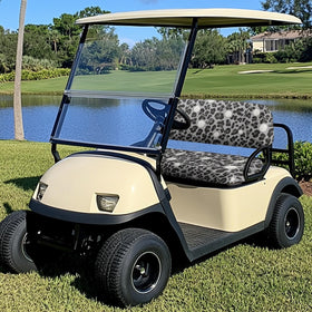 Knextrepoy backrest seat cover in gray leopard print adds comfort on the course.