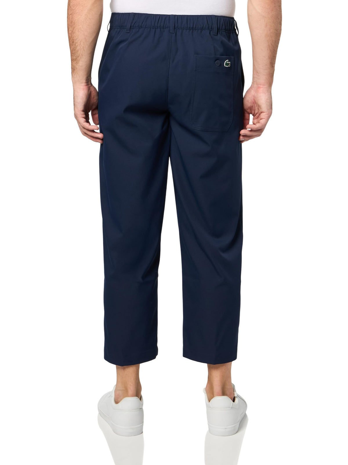 Lacoste Men's SPORT Ultra Dry golf pants weave texture close-up highlighting durable twill fabric