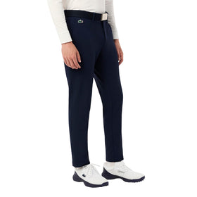 Lacoste Sport pants with grip band, back view, polo stays in place.