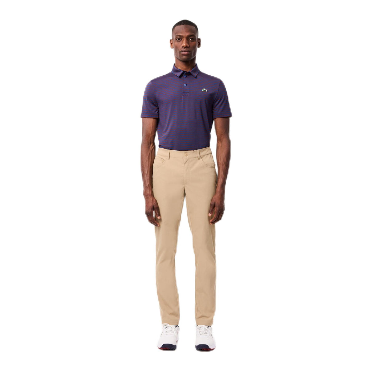 Lacoste Sport Ultra Dry slim-fit golf pants ochre, front view highlighting sleek athletic silhouette.