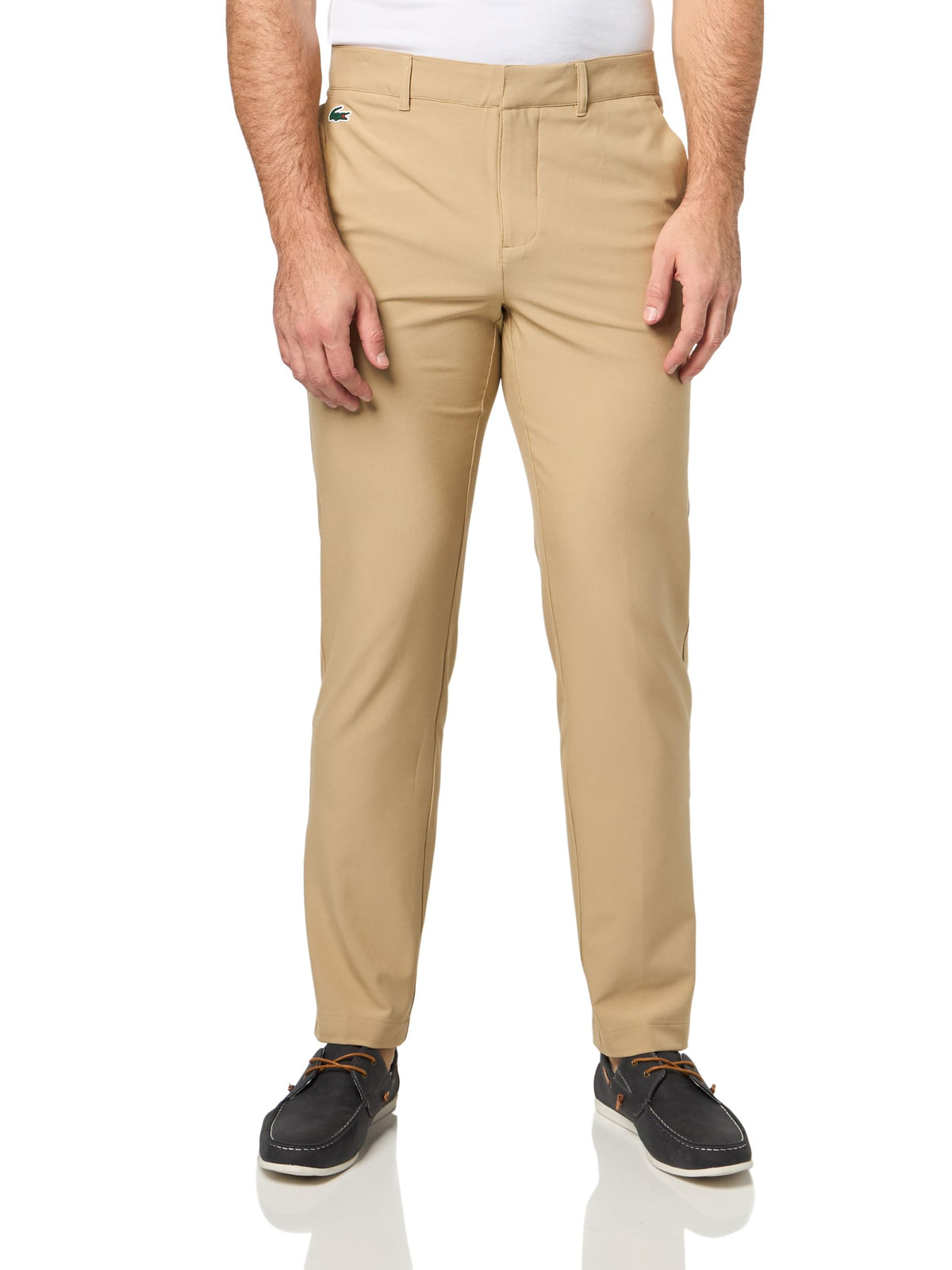 Lacoste Sport Ultra Dry slim-fit golf pants on the green showing mobility