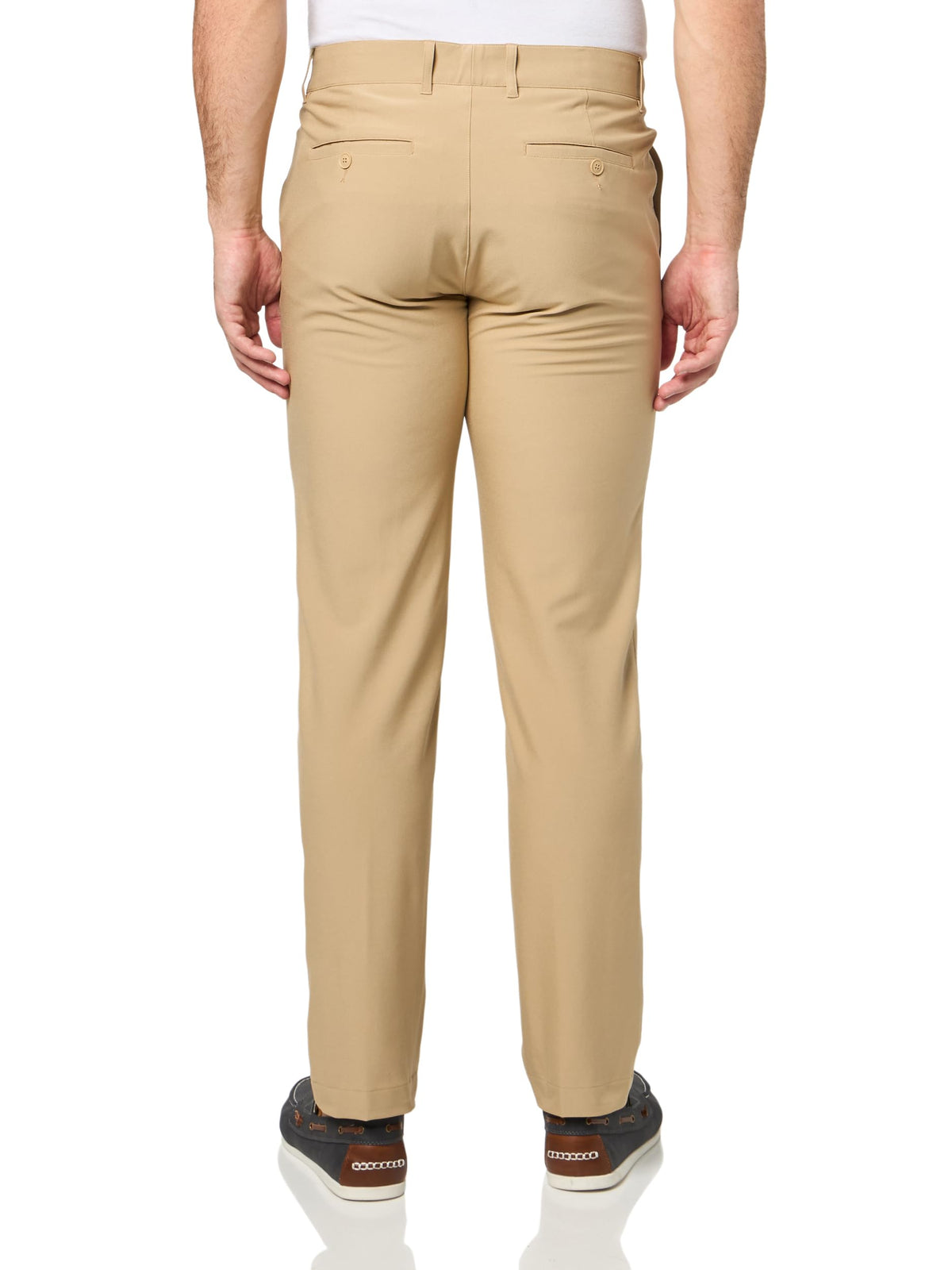 Lacoste pants on model demonstrating on-course and off-course versatility