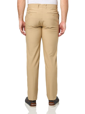 Lacoste pants on model demonstrating on-course and off-course versatility