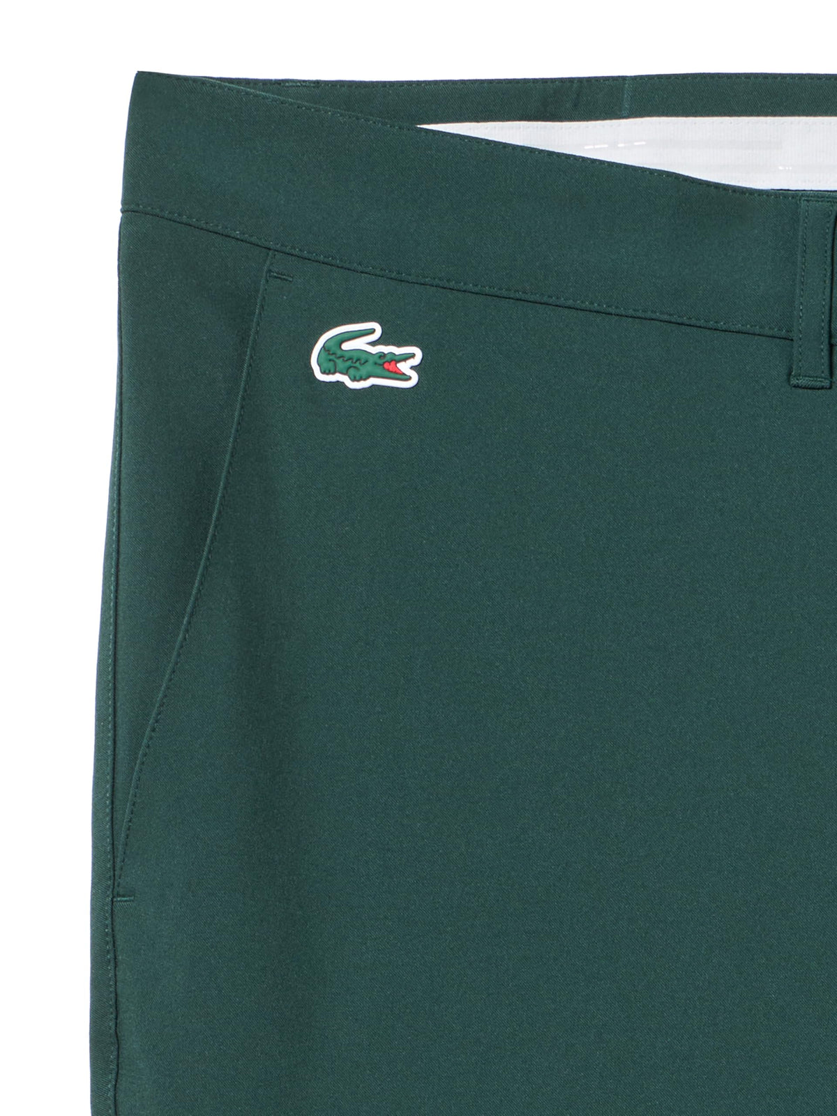 Lacoste Sport Ultra Dry slim-fit pants side view with practical pockets for on-course essentials.