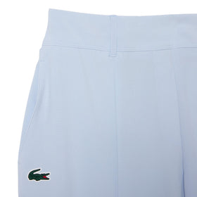 Lacoste pants waist detail illustrating comfortable tailoring for on-course wear.