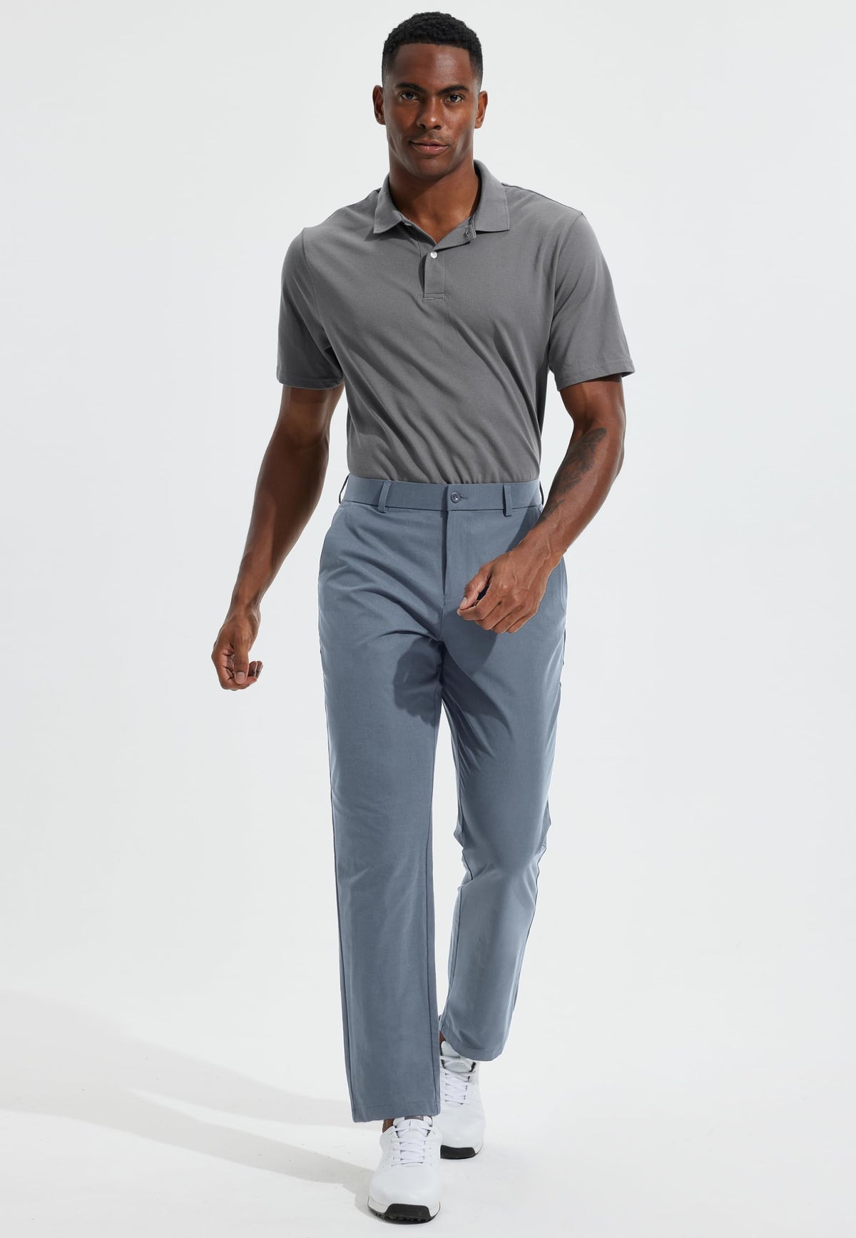 Libin men's golf pants on model during swing on course