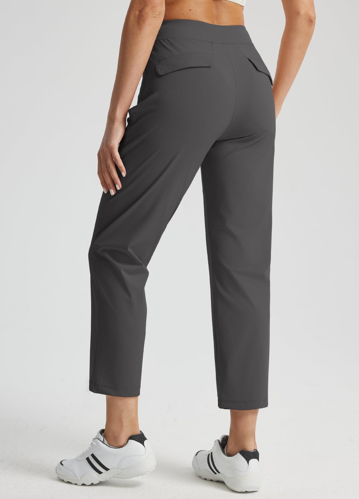 Libin golf pants feature hidden zipper pockets to secure essentials.