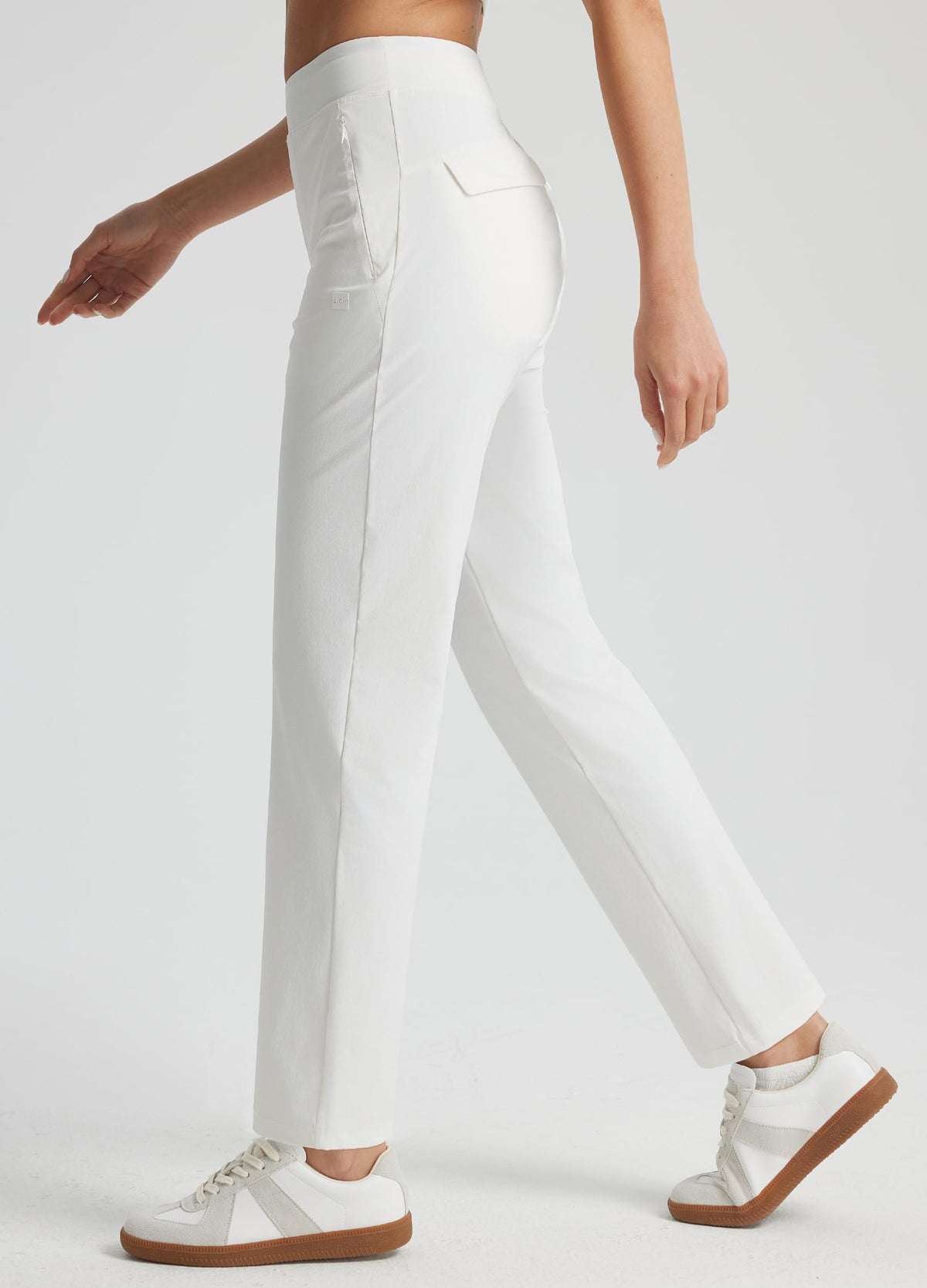 Libin pants reveal hidden zipper pockets on sides and back for valuables.