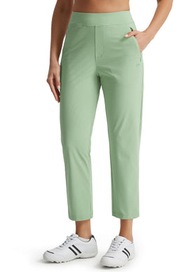 Libin women's golf pants in green showing stretchy fabric for swing comfort