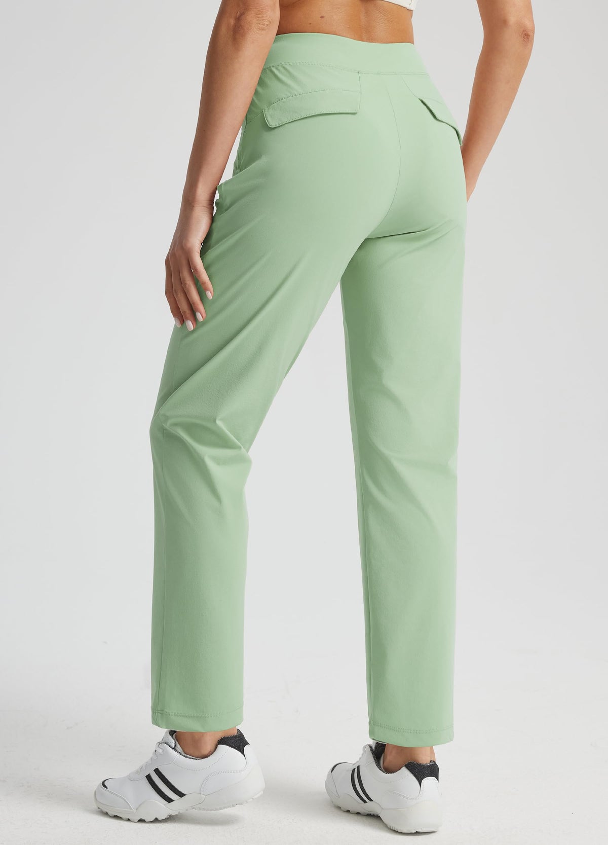 Libin golf pants side view highlighting stretchy fabric and tapered silhouette