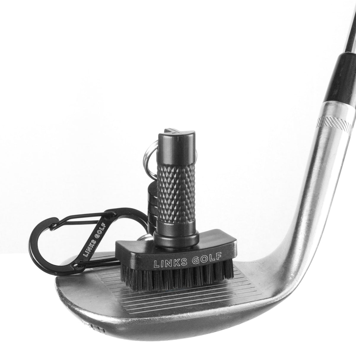 Links Golf mini brush with quick-release magnet cleans clubs between shots for on the go.