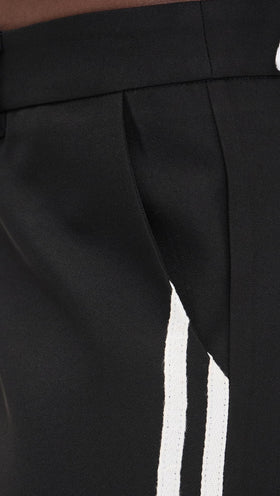 Lioness Genesis Pants Noir on model demonstrating versatile business-casual wear