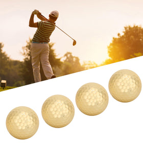 Gold finish reflecting sunlight on Locadence golf ball for easy tracking.