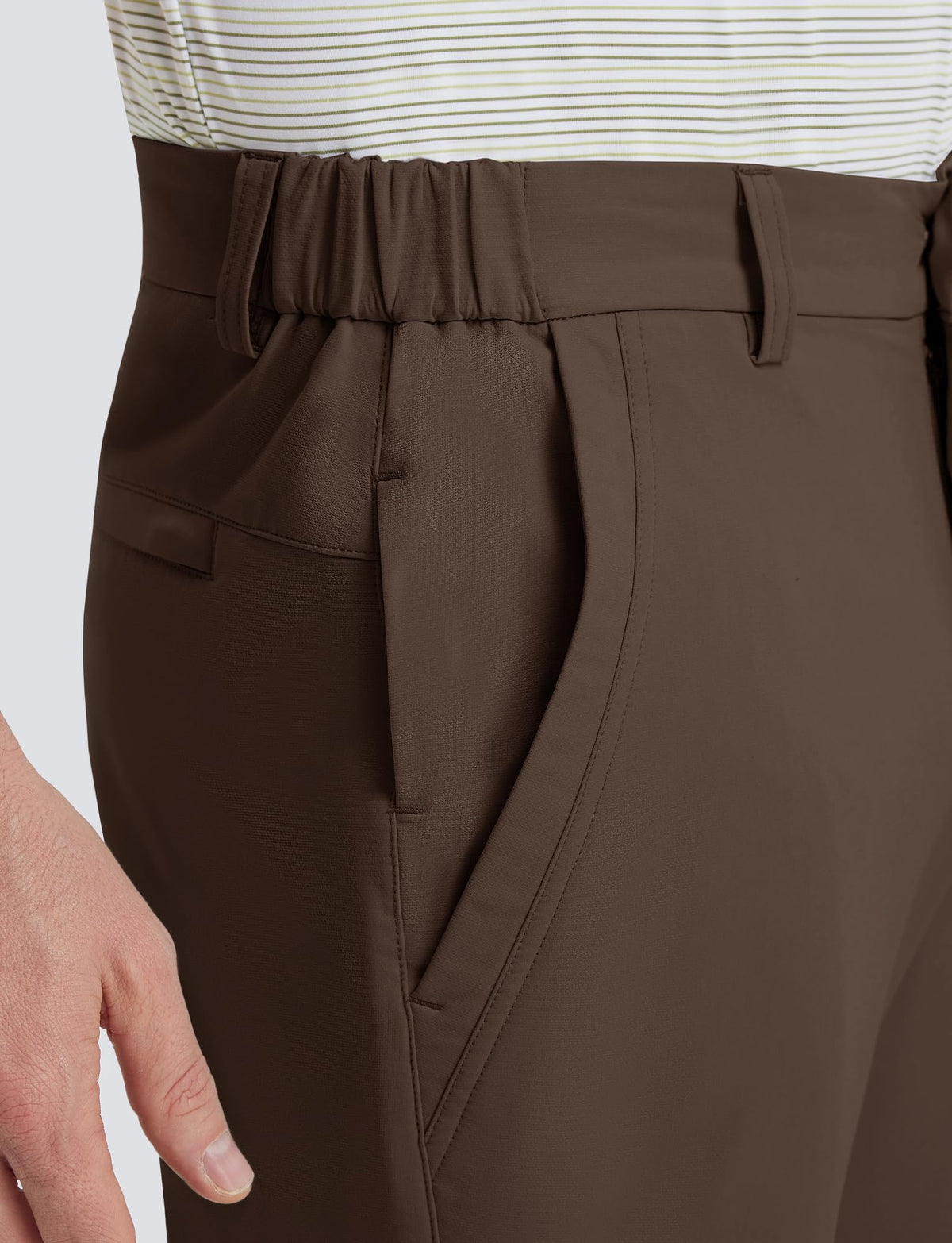 M MAELREG golf pants water-repellent fabric close-up demonstrates quick-dry performance.