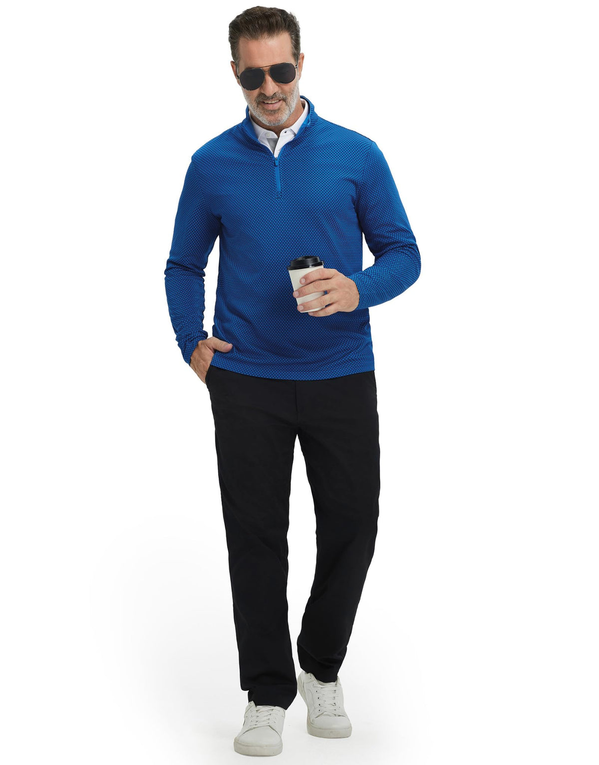 M MAELREG quarter zip pullover on model during golf, ready for performance and style
