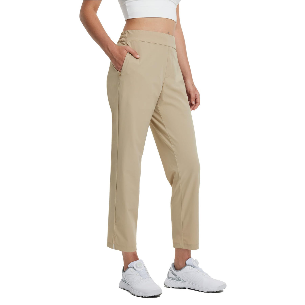 Maelreg women's golf pants with zip-side pockets for secure on-course storage.
