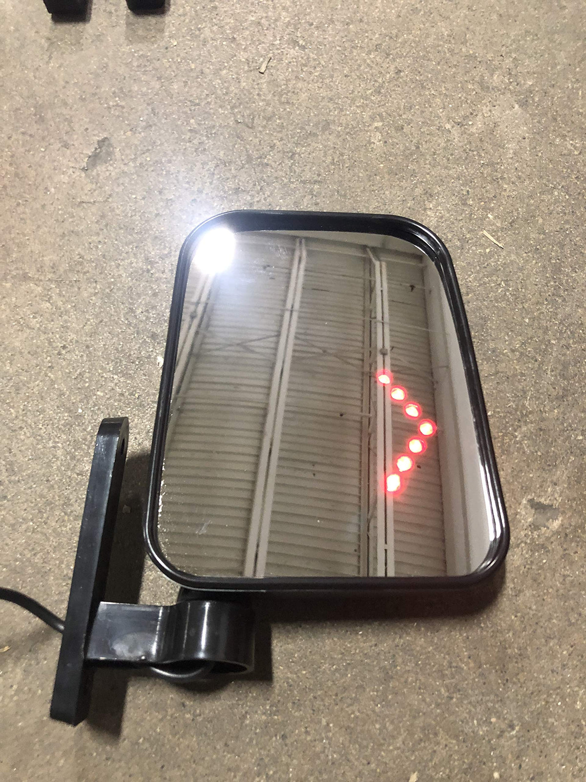 Mav Maverick Advantage LED turn signal integrated on golf cart mirror.