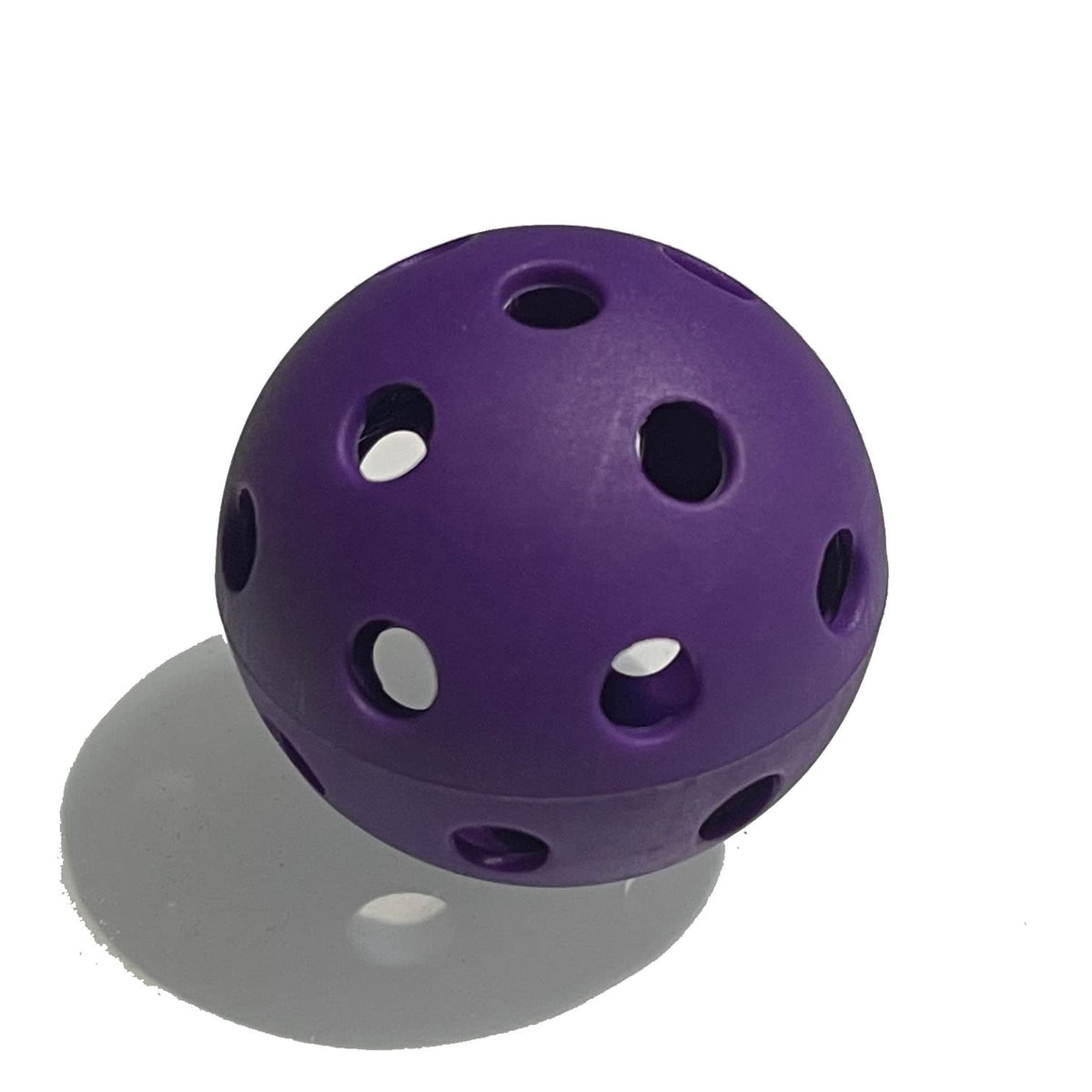 MaxBP golf size training ball in purple improves swing timing during practice