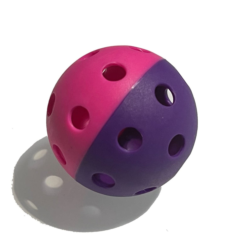 MaxBP golf-size training ball split pink purple for focused practice and hand-eye coordination