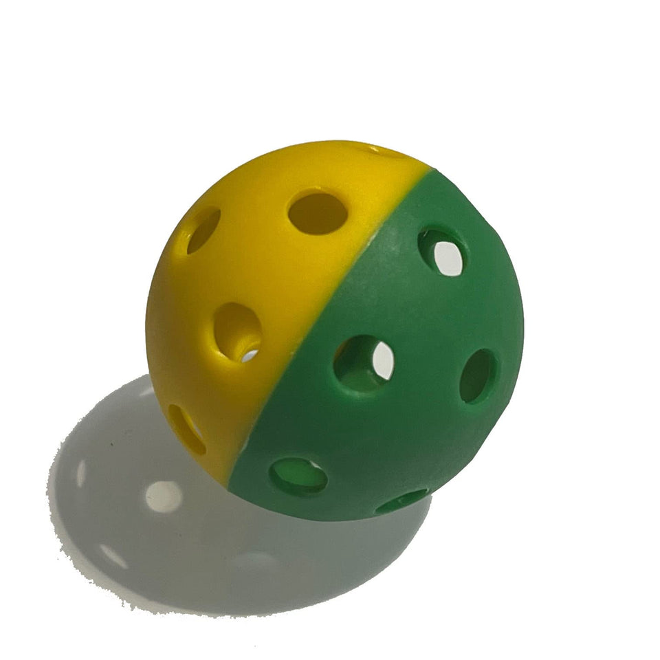 MaxBP golf-size training ball in yellow-green split for precise batting practice.