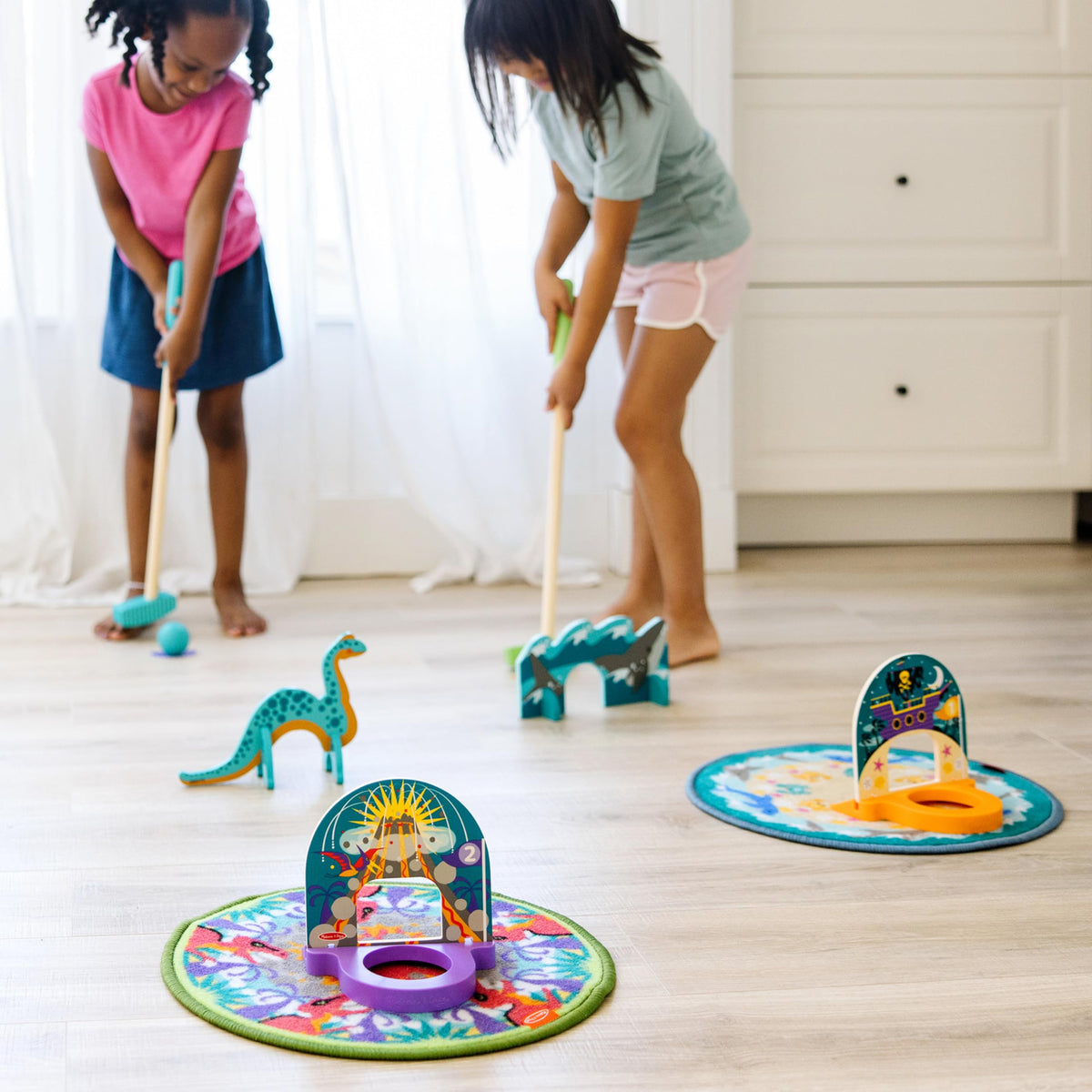 Melissa & Doug wooden golf clubs support confident grips for beginners.