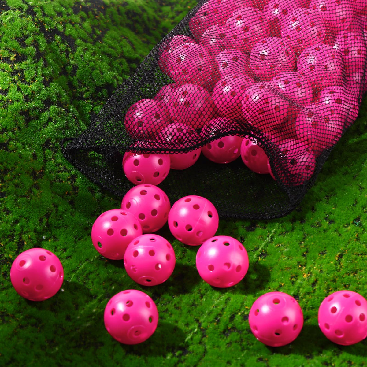 Rose red MiniInflat practice ball in backyard setting