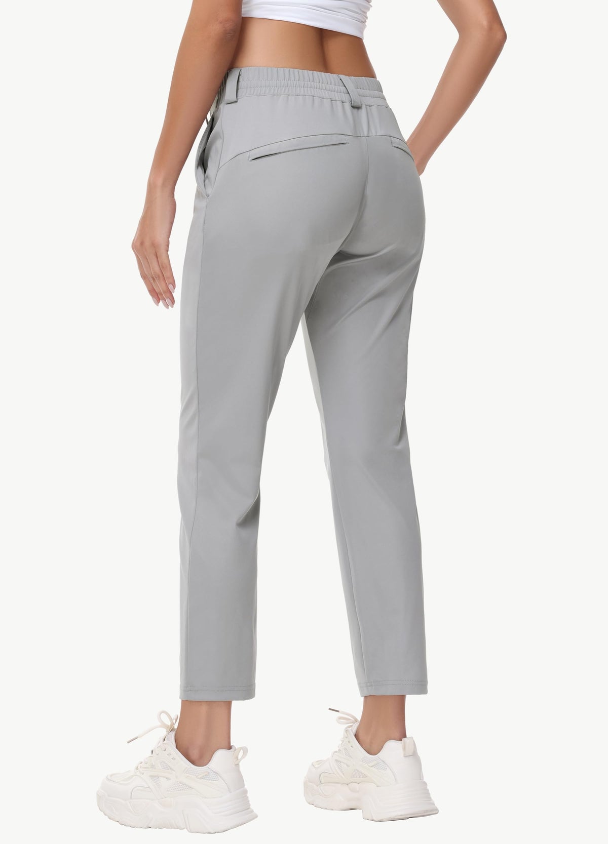 MIVEI women's 27-inch stretch golf pant waistband with drawstring close-up, illustrating adjustable fit.