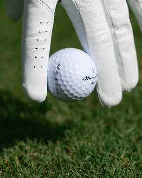 Mizuno Pro S golf ball showing thinner cover for softer feel and speed.