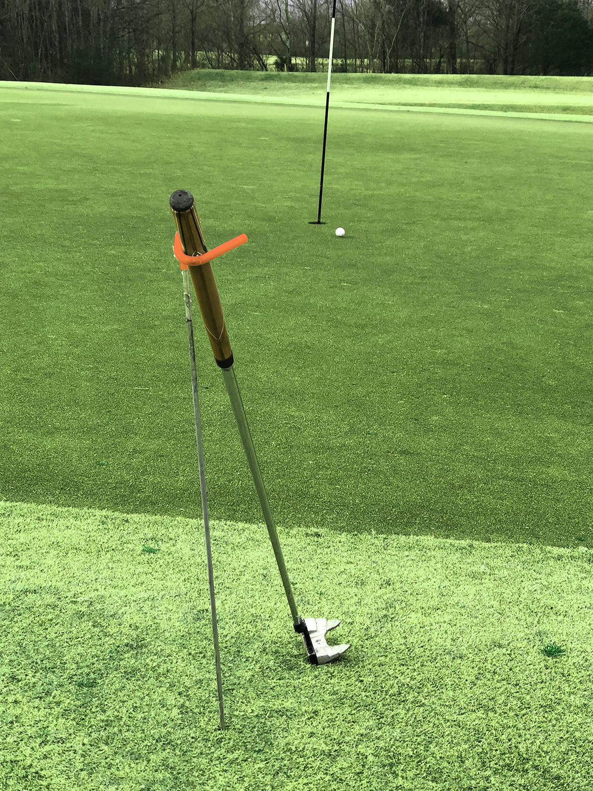 Mobile Pro Shop easy carry golf club stand shown on the fairway or practice area