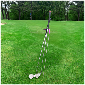 Mobile Pro Shop V-Stick stand on the fairway keeps clubs clean and visible.