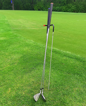 Mobile Pro Shop V-Stick stand keeps golf clubs clean and dry on the fairway.