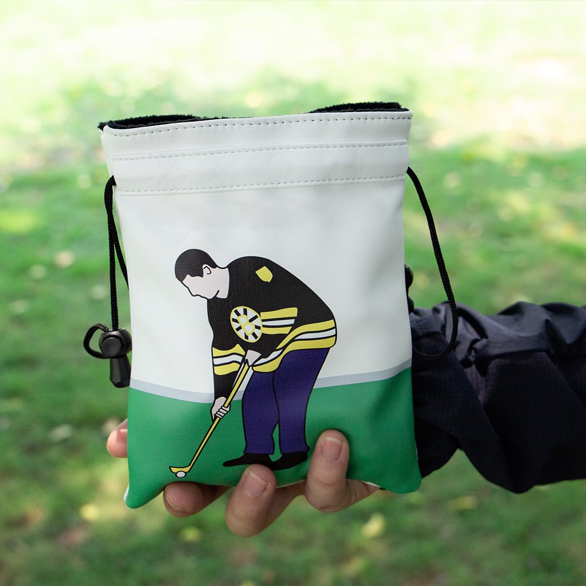 Montela Golf Ball Marker and Divot Tool Pouch keeps essentials organized.