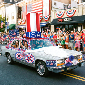 Movinpe paper fans provide colorful accents for parades and celebrations