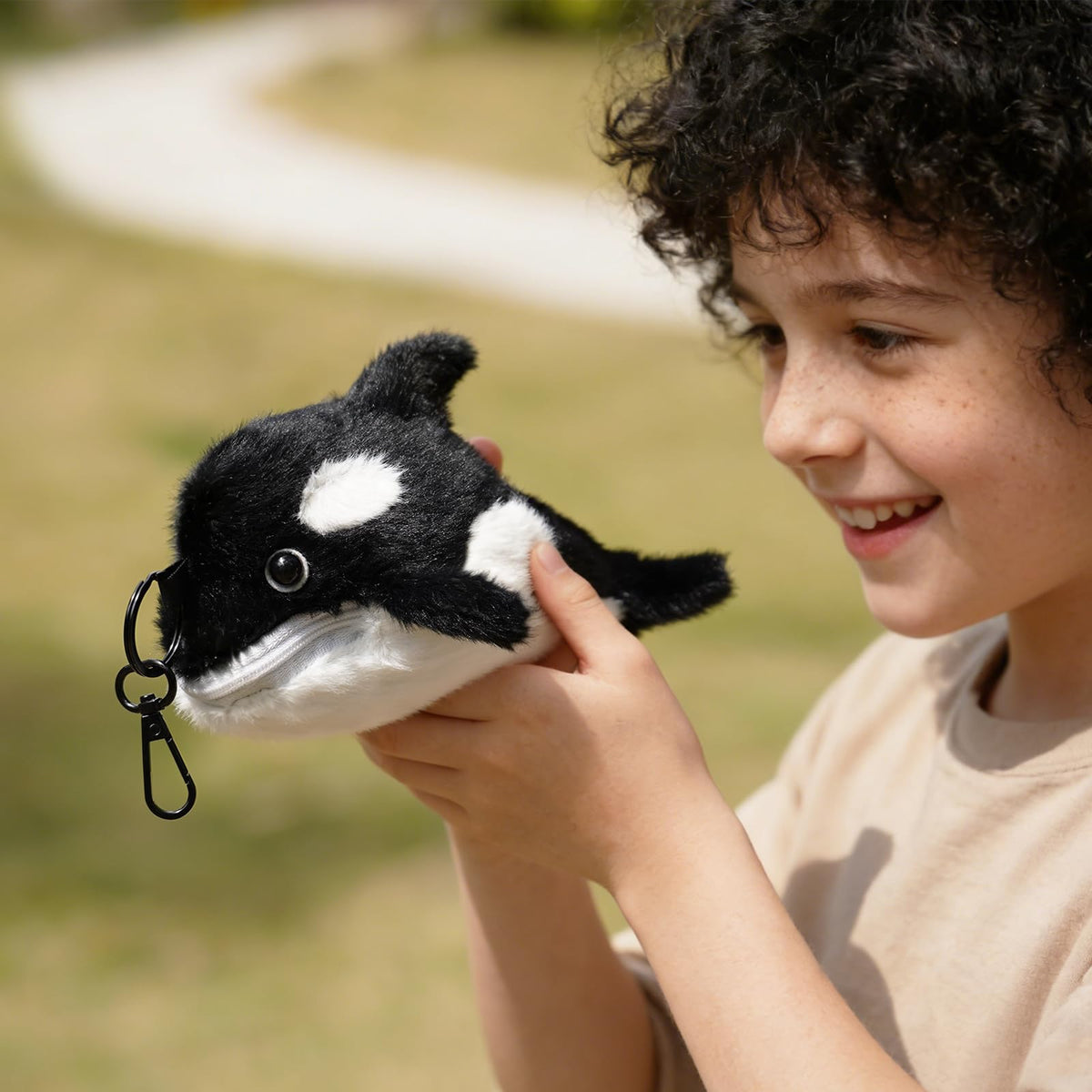 mytag Orca plush texture closeup emphasizes soft, friendly feel