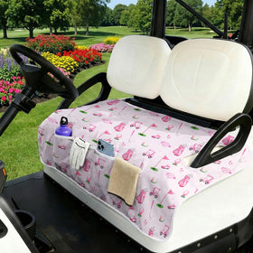 Neapth pink seat blanket with four pockets keeps essentials within reach.