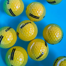 Nerpinper yellow floating golf balls in a pool ready for water practice
