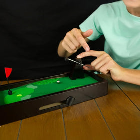 New Entertainment Desktop Golf includes ball, putter, green, and flag for complete setup