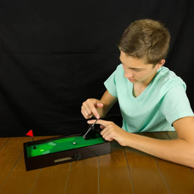 New Entertainment Desktop Golf features a variable slope for changing putting challenges