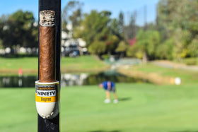 Ninety Degree Wedge mounted on a deck to protect cigars during outdoor use