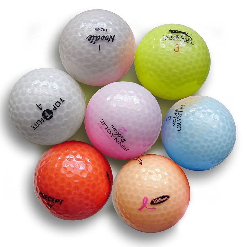 Nitro Crystal recycled golf balls in a mesh bag with mixed colors for practice.