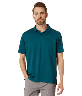 Oakley Icon TN Protect RC Polo on model, moisture-wicking for on-course dry comfort.