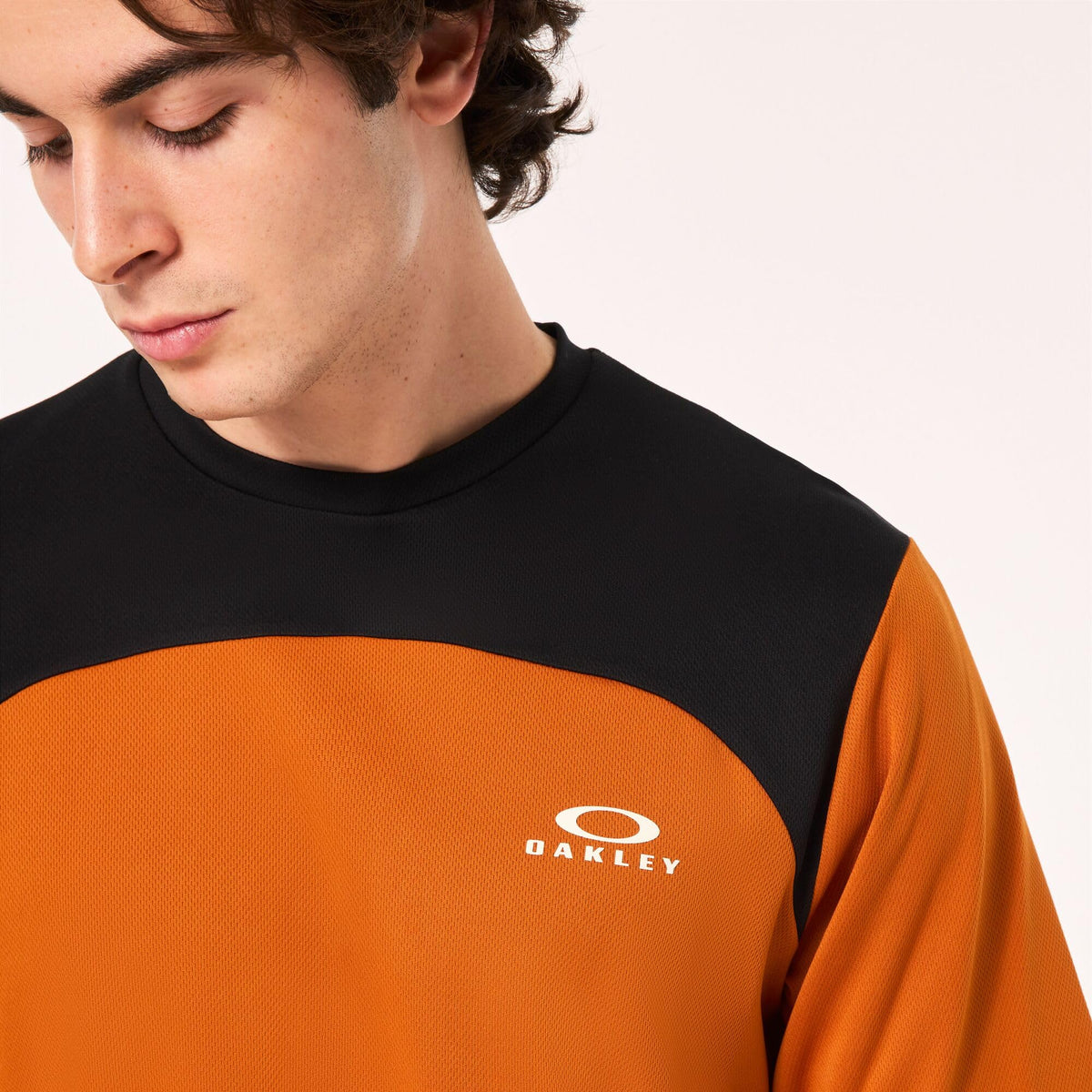 Oakley orange colorway improves visibility and style on summer rides