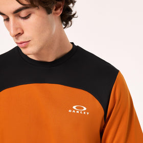 Oakley orange colorway improves visibility and style on summer rides